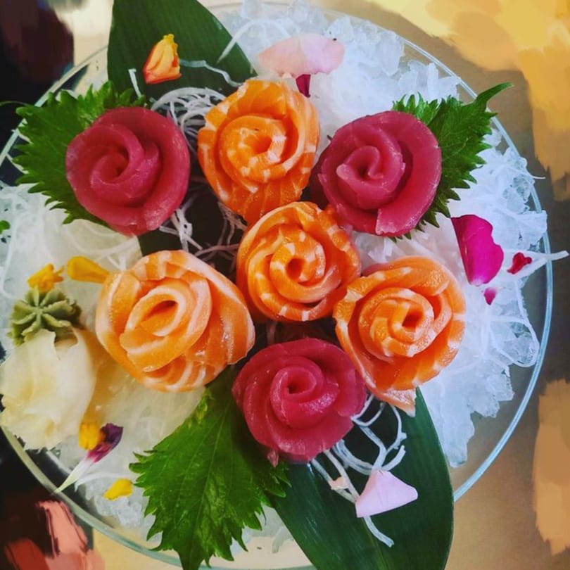 Katsumori Asian Fusion's sashimi platter features salmon and tuna roses on ice with wasabi and ginger.